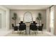 Elegant dining room with oval table, stylish chairs, modern lighting, and decorative accessories at 4719 Bold Peacock Bnd, Bartow, FL 33830
