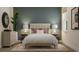 Serene bedroom featuring a plush bed, bedside tables with lamps, soothing wall color, and an overall cozy ambiance at 4791 Waltham Forest Dr, Davenport, FL 33837