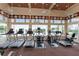 Well-equipped fitness center featuring treadmills and stationary bikes with natural light and ceiling fans at 5303 Dagenham Dr, Davenport, FL 33837