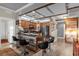 Charming kitchen features a breakfast bar, wood cabinets, and stainless steel appliances at 7615 Heritage Crossing Way # 102, Reunion, FL 34747
