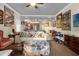 Spacious living room with an open layout and easy access to the kitchen area at 7615 Heritage Crossing Way # 102, Reunion, FL 34747