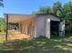 Barn featuring large open bay door at 24605 Ne 177Th Ter, Fort Mc Coy, FL 32134