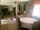 View of dining room leads to living area, showcasing an open and inviting floor plan for easy flow and interaction at 24605 Ne 177Th Ter, Fort Mc Coy, FL 32134