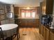 Eat-in kitchen featuring natural wood cabinets and plenty of counter space at 24605 Ne 177Th Ter, Fort Mc Coy, FL 32134