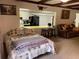 Cozy room with view to a kitchen featuring a breakfast bar, and comfortable seating at 24605 Ne 177Th Ter, Fort Mc Coy, FL 32134