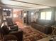 Cozy living room with wooden floors and furniture at 24605 Ne 177Th Ter, Fort Mc Coy, FL 32134