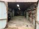 Outbuilding featuring an open interior with lighting and tool storage at 24605 Ne 177Th Ter, Fort Mc Coy, FL 32134