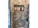 Detailed shot of the tiled shower area, including a built-in toiletry niche at 24605 Ne 177Th Ter, Fort Mc Coy, FL 32134