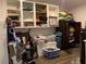 Organized storage area with shelving and storage containers, providing ample space for belongings at 24605 Ne 177Th Ter, Fort Mc Coy, FL 32134