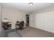 Bright room is perfect for a study featuring a closet and a small desk with a chair at 4111 Se 131St Ln, Belleview, FL 34420