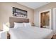 Inviting bedroom with a neutral palette and an attached bathroom at 7540 Brooklyn Dr, Kissimmee, FL 34747