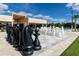 Large chess set sitting on a tiled area near a clubhouse and pool at 7540 Brooklyn Dr, Kissimmee, FL 34747