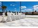 Oversized chess set located on a tiled area near a sand volleyball court at 7540 Brooklyn Dr, Kissimmee, FL 34747