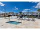 A hot tub and a giant chess set are some of the amenities offered at the Magic Village Views community at 7540 Brooklyn Dr, Kissimmee, FL 34747