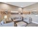 Comfortable living area with soft lighting, stylish seating, and decorative wall art at 7540 Brooklyn Dr, Kissimmee, FL 34747