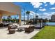 A lounge area in the Magic Village Views community is equipped with comfortable furniture and a tennis court at 7540 Brooklyn Dr, Kissimmee, FL 34747