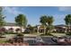 Exterior of the community clubhouse surrounded by mature landscaping and parked cars at 3217 Armstrong Ave, Clermont, FL 34714
