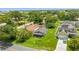 Aerial view of a single Gathering home with driveway and mature landscaping in a residential neighborhood at 515 9Th St, Winter Garden, FL 34787