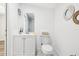 Updated bathroom with modern vanity, mirror, and elegant fixtures at 515 9Th St, Winter Garden, FL 34787