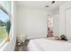 Spacious bedroom with hardwood floors and a modern aesthetic at 515 9Th St, Winter Garden, FL 34787
