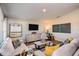 Comfortable living room with stylish decor, modern furnishings, and neutral tones at 1010 Foreshore Ln, Haines City, FL 33844