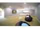 Large bonus room with a TV, beanbag chairs, and neutral paint at 5118 Norriswood Dr, Mulberry, FL 33860