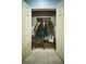 Organized closet space with shelving, hanging storage, and bench seating at 5118 Norriswood Dr, Mulberry, FL 33860