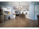 Open floor plan with a dining area leading into a kitchen with bar stool seating at 5118 Norriswood Dr, Mulberry, FL 33860