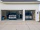 Spacious two-car garage with ample storage space for vehicles and tools at 5118 Norriswood Dr, Mulberry, FL 33860