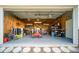 Well-organized garage interior with storage, workbench, and ample open space at 5118 Norriswood Dr, Mulberry, FL 33860