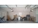 An empty garage with a side door and a single window at 5118 Norriswood Dr, Mulberry, FL 33860