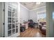 Bright office with wood floors, neutral walls, and a window that provides natural light at 5118 Norriswood Dr, Mulberry, FL 33860