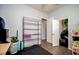 Versatile bonus room with laminate floors, and ample storage opportunities at 5118 Norriswood Dr, Mulberry, FL 33860