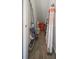 A storage room is stocked with cleaning supplies, ladders and other household equipment at 5118 Norriswood Dr, Mulberry, FL 33860