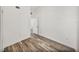 Bedroom featuring wood-look flooring and neutral paint at 720 W 14Th St, Lakeland, FL 33805