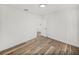 Bedroom featuring wood-look flooring and neutral paint at 720 W 14Th St, Lakeland, FL 33805