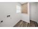 Bright utility room featuring a window and washer and dryer hookups at 720 W 14Th St, Lakeland, FL 33805