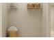Walk-in closet featuring wire shelving, woven baskets, and a stool topped with folded towels, providing storage solutions at 759 Terrapin Dr, Debary, FL 32713
