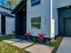 View of the home's modern number detail, landscaping, and walkway to the front door at 720 W 14Th St, Lakeland, FL 33805