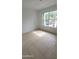 Well-lit bedroom features a large window at 1533 Still Dr, Clermont, FL 34714