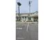 Inviting condo building with landscaped grounds and designated parking at 1533 Still Dr, Clermont, FL 34714