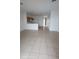 Open concept living space with tile flooring at 1533 Still Dr, Clermont, FL 34714