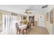 Bright dining room with a large table, perfect for Gathering gatherings and entertaining guests at 2453 Teri St, Auburndale, FL 33823