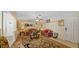 Cozy living room featuring comfortable seating, a ceiling fan, and a large rug at 2453 Teri St, Auburndale, FL 33823