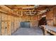 Interior view of a run-down shed with exposed wood beams at 2453 Teri St, Auburndale, FL 33823
