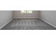 Bedroom featuring plush carpet and a window providing natural light at 5333 Sw 81St Cir, Ocala, FL 34481