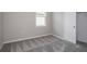 Comfortable bedroom with soft carpet and a closet, offering a serene and functional space at 5333 Sw 81St Cir, Ocala, FL 34481
