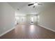 Open-concept living room featuring hard surface floors and lots of natural light at 7721 Somersworth Dr, Kissimmee, FL 34747