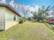 Nice backyard with lots of grass and a fenced perimeter at 1625 Crystal E Ct, Lakeland, FL 33801