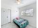 bedroom with a ceiling fan, a closet, and a window providing natural light at 1625 Crystal E Ct, Lakeland, FL 33801